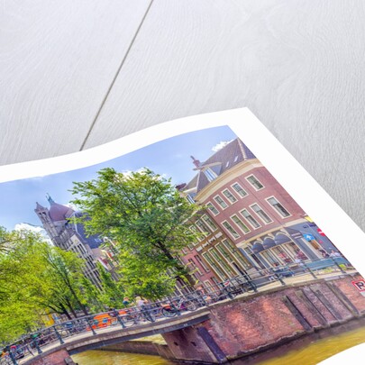 Canal through Amsterdam city by Assaf Frank